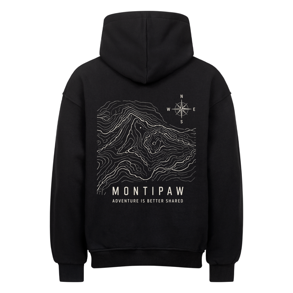 Schwarzer Montipaw Oversized Hoodie in Rückansicht mit weißem topografischem Bergmotiv, Kompass und „Adventure is better shared“-Schriftzug.
