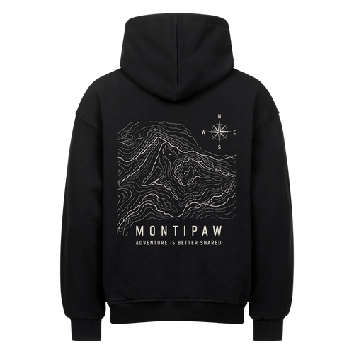 Schwarzer Montipaw Oversized Hoodie in Rückansicht mit weißem topografischem Bergmotiv, Kompass und „Adventure is better shared“-Schriftzug.